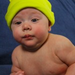 Picture of cute baby in frog hat