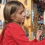 Little girl shopping for jewelry