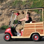 Man driving golf cart