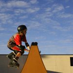 Kids on skate boards royalty free pictures