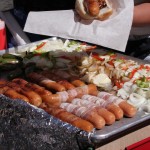 Street Food Vendor hot dogs grill sausages onions