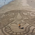 Face Art Designs on the beach in San Diego